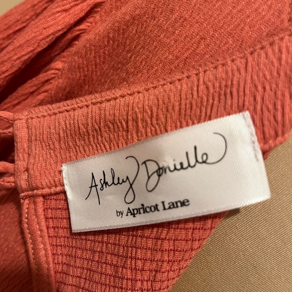Romper by Apricot Lane x
Ashley Danielle in Tangerine, size L - Picture 4 of 7